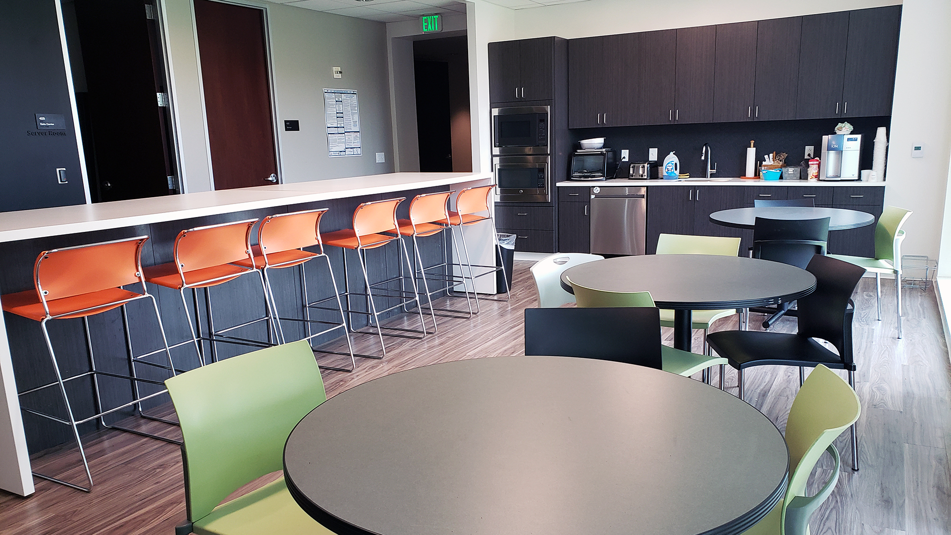 Image of Breakroom seating and kitchen area