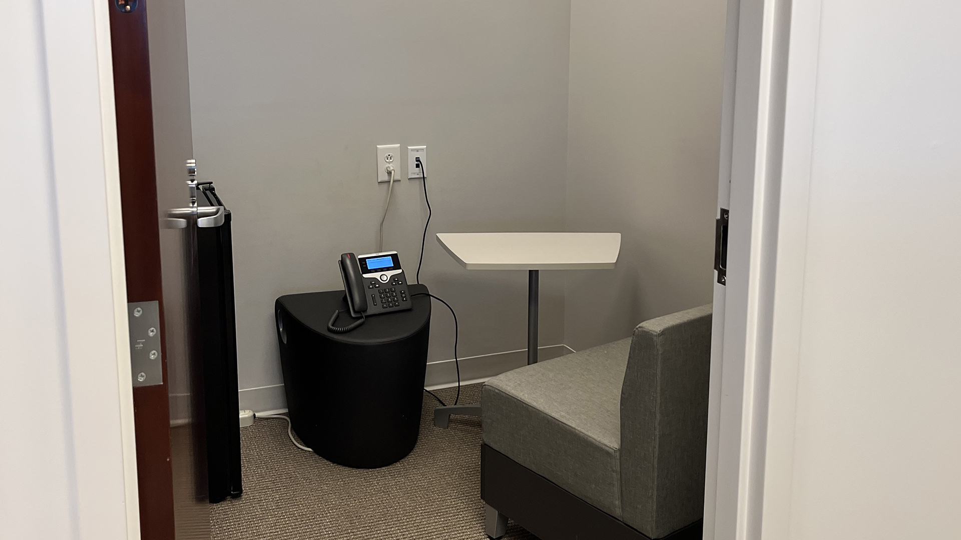Private Call room with chair and phone