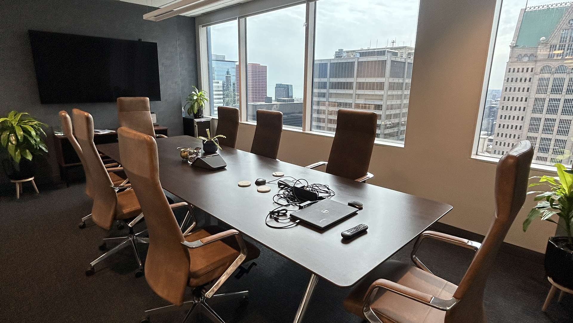 Concerence room with table and city views at 10 S LaSalle in Chicago IL 