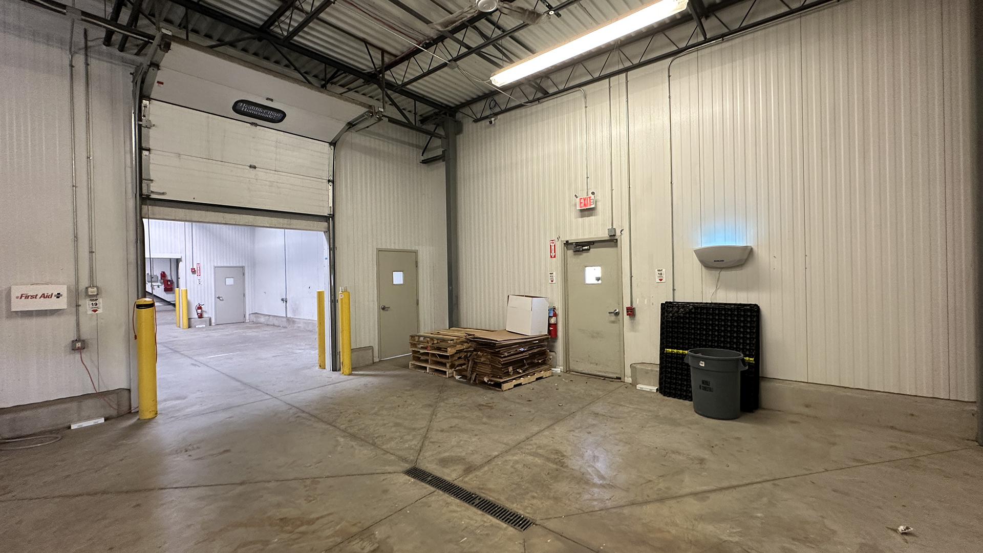 Open dock door inside a warehouse facility at 1215 Gostlin Street
