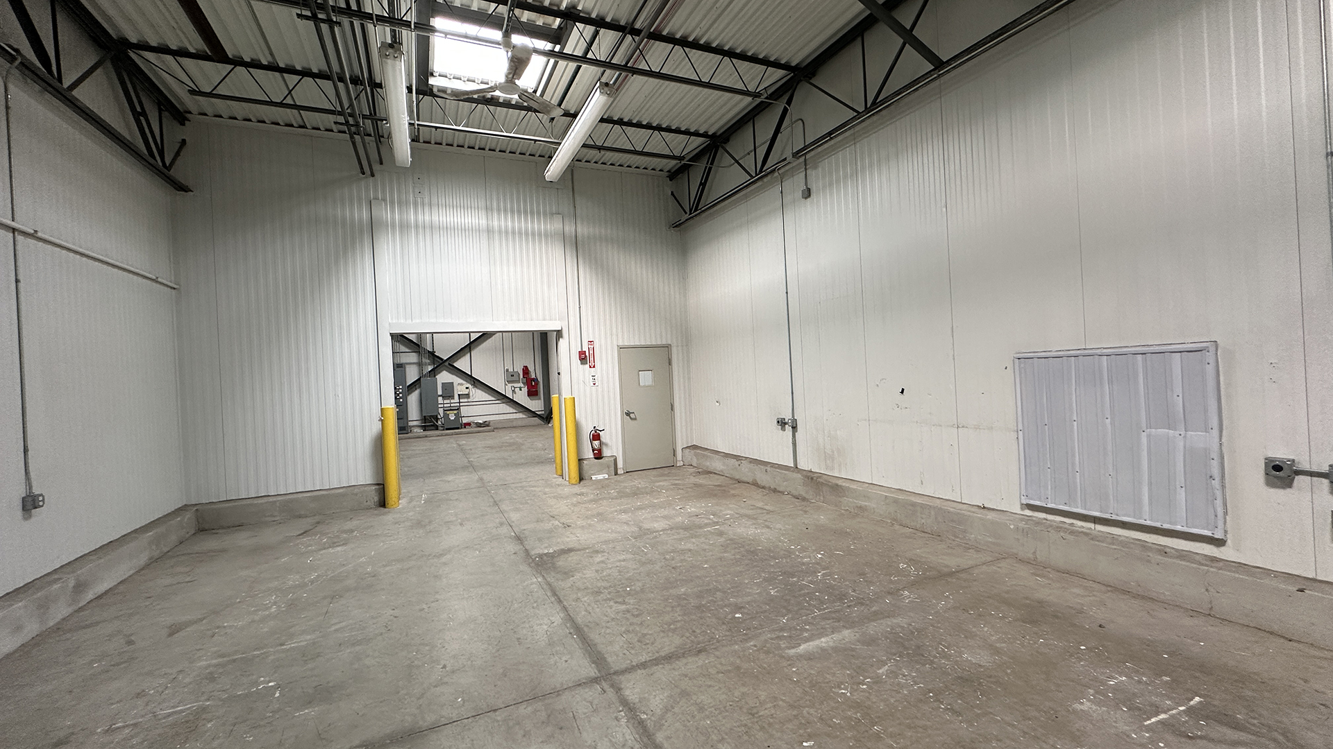 Interior shot of loading dock and empty warehouse space at 1215 Gostlin Street