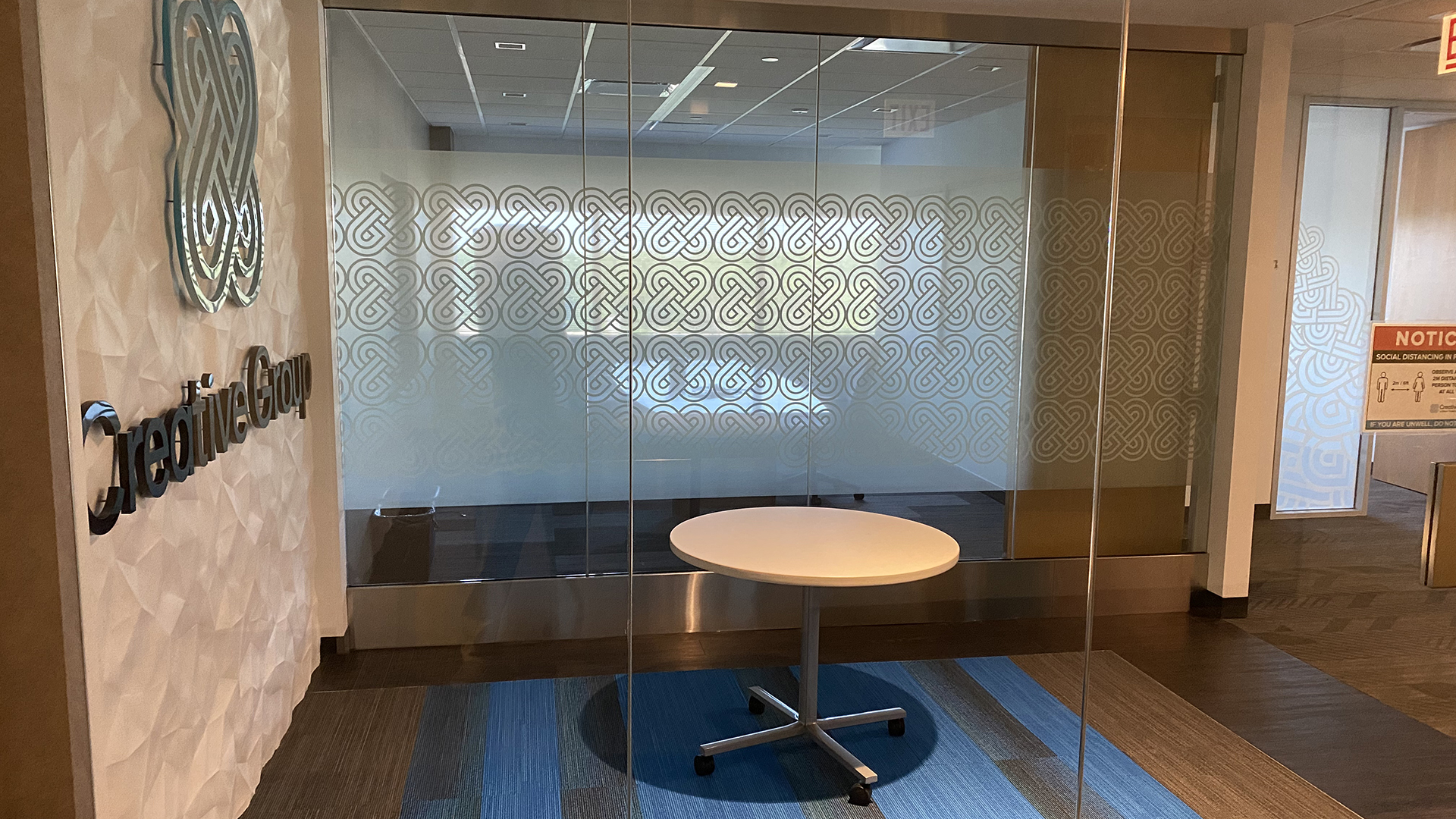 Interior shot of meeting room at 200 N Martingale with small table