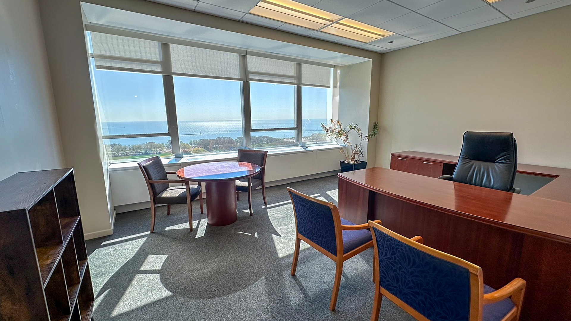 Interior shot of office with window overlooking lake