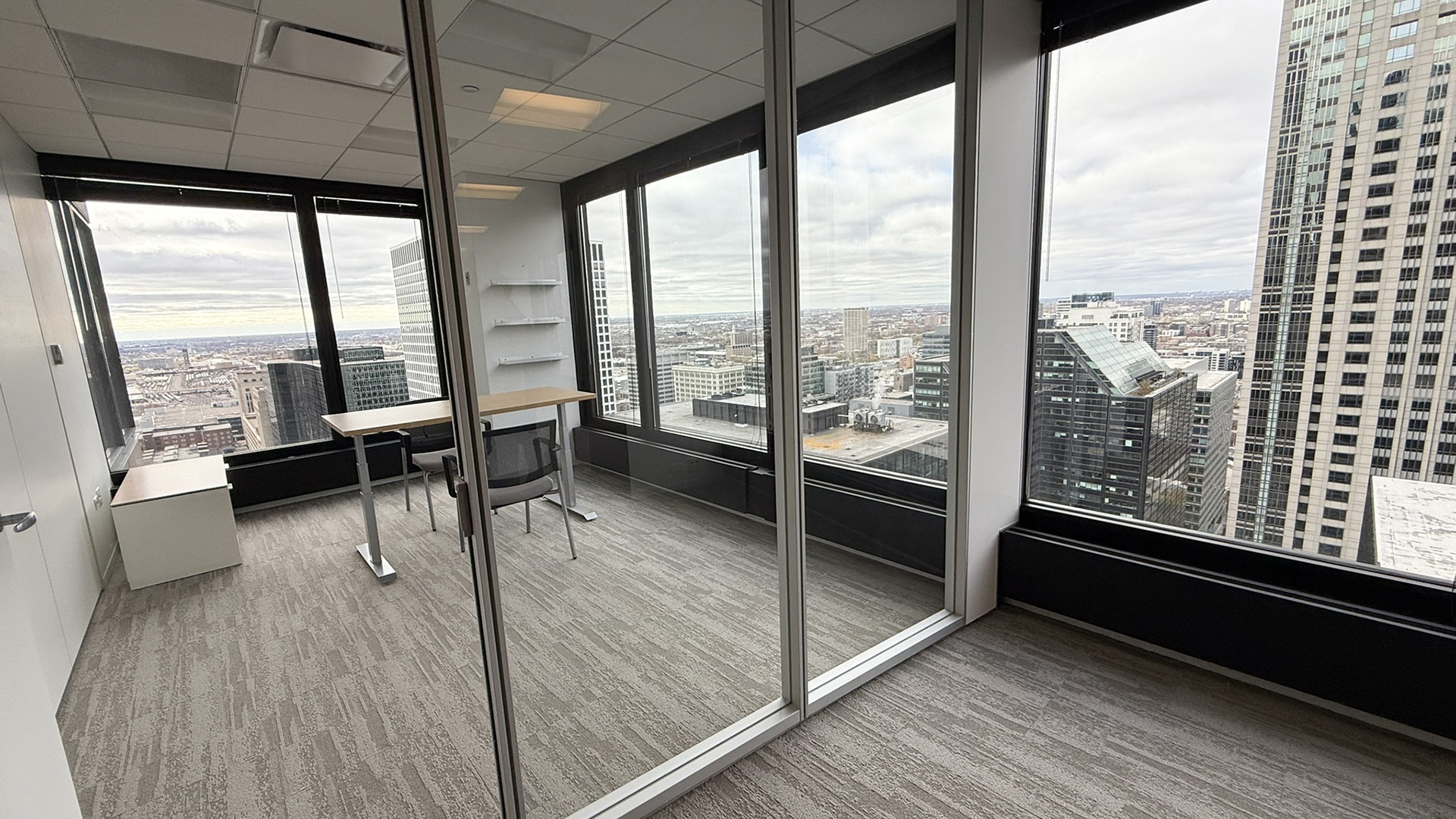 Corner interior office with city views 