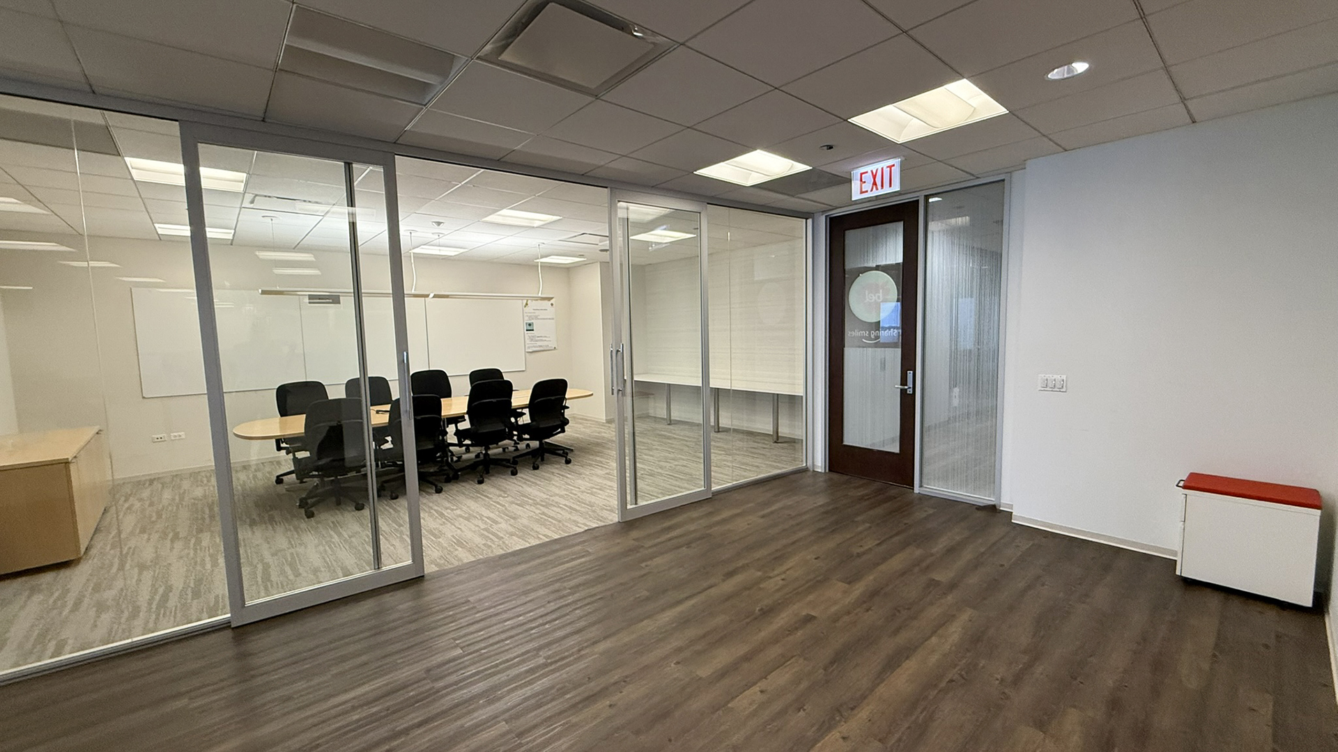 Exterior shot of glass conference room with conference table at 30 S Wacker