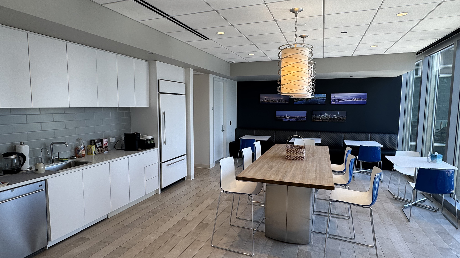 Kitchen and common area with floor to cieling windows at 300 N LaSalle