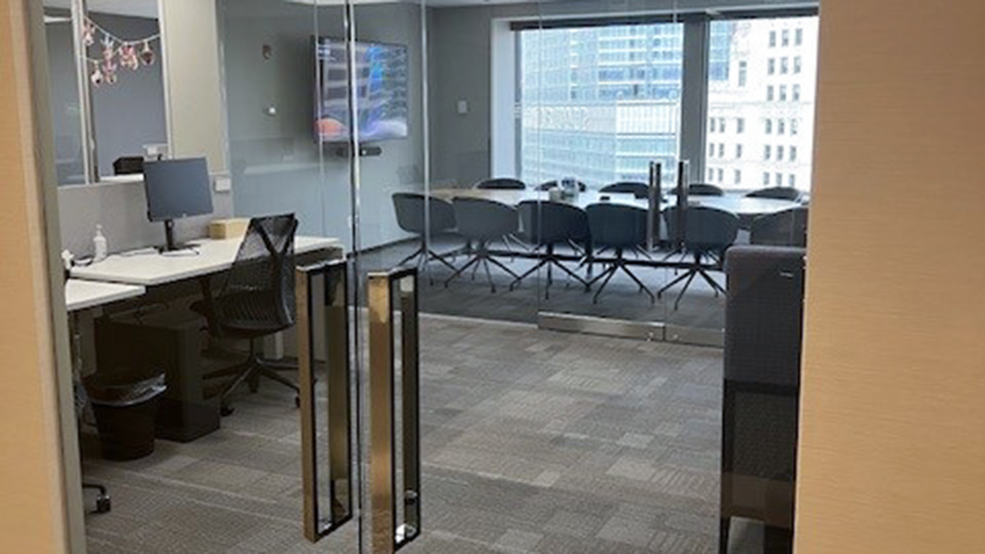 Entrance of office with view of conference room table at 401 N Michigan