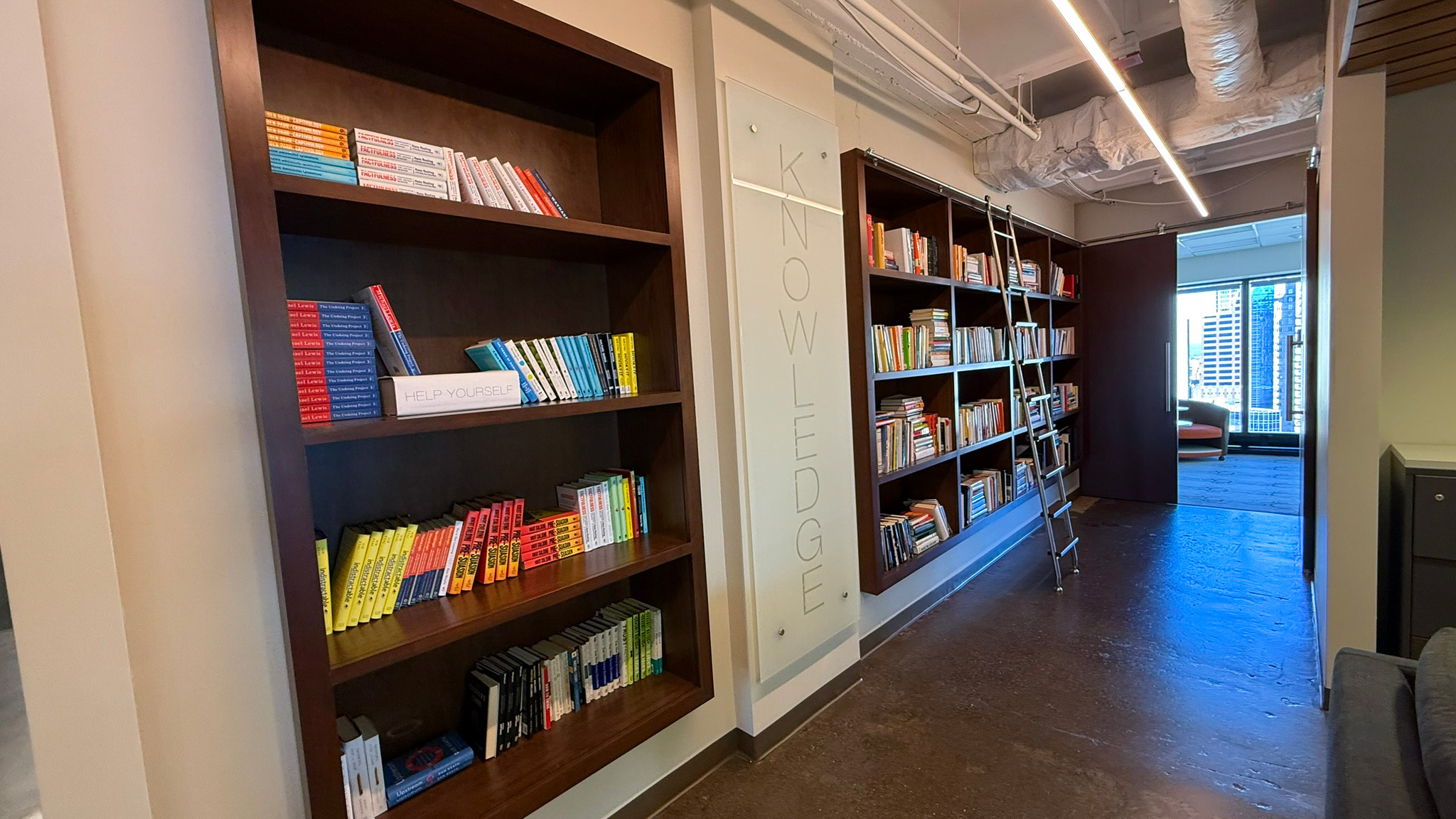 Book shelves in the hall at 444 N Michigan