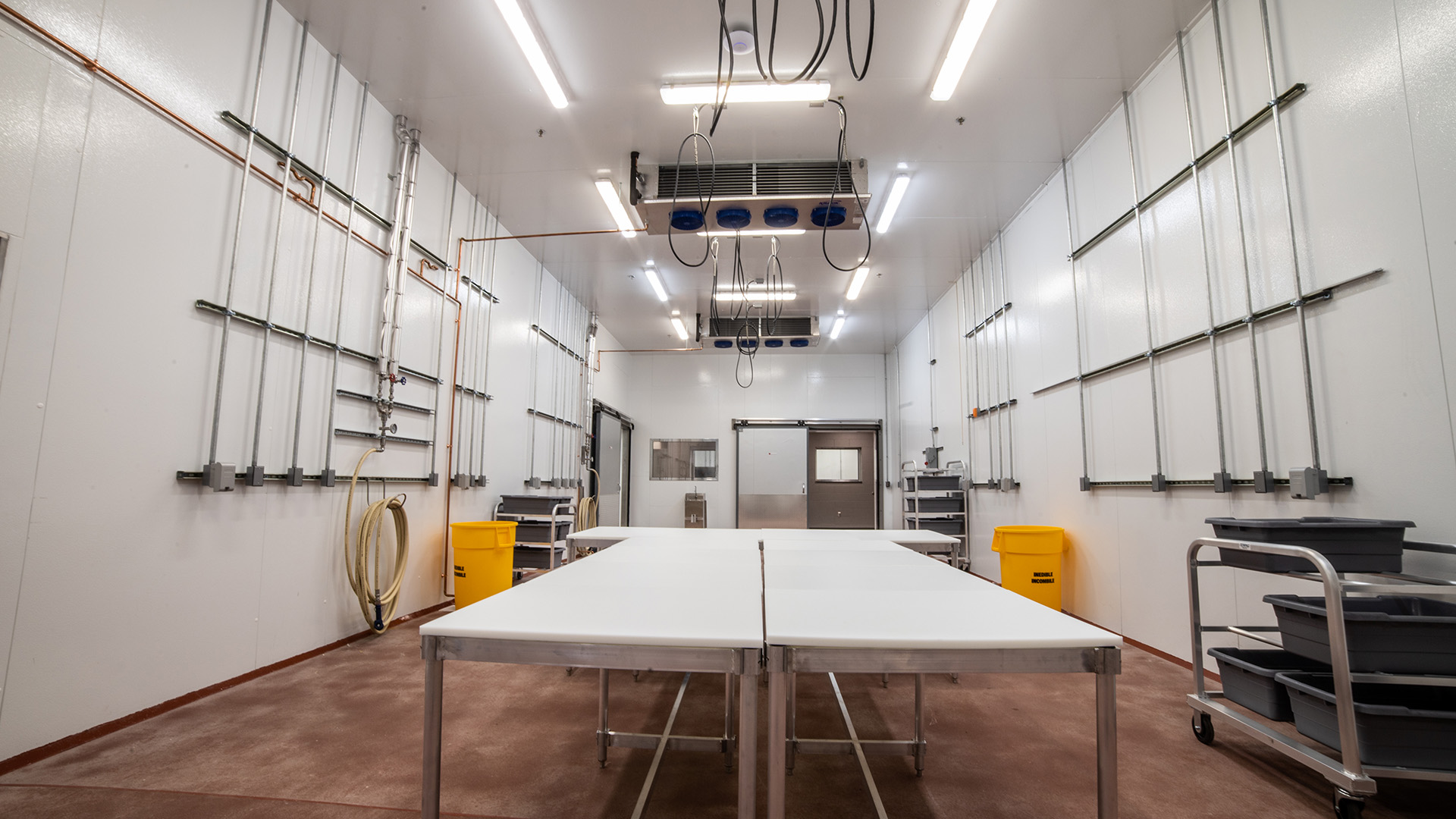 Food processing set up inside of white room with machinery at 4808 Kanawha