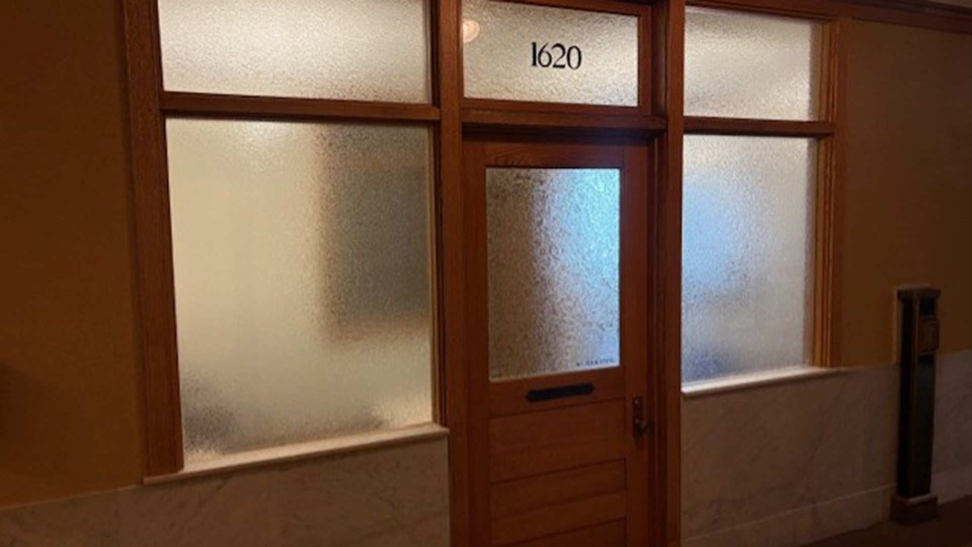 door entering suite 1620 at 53 W Jackson Building