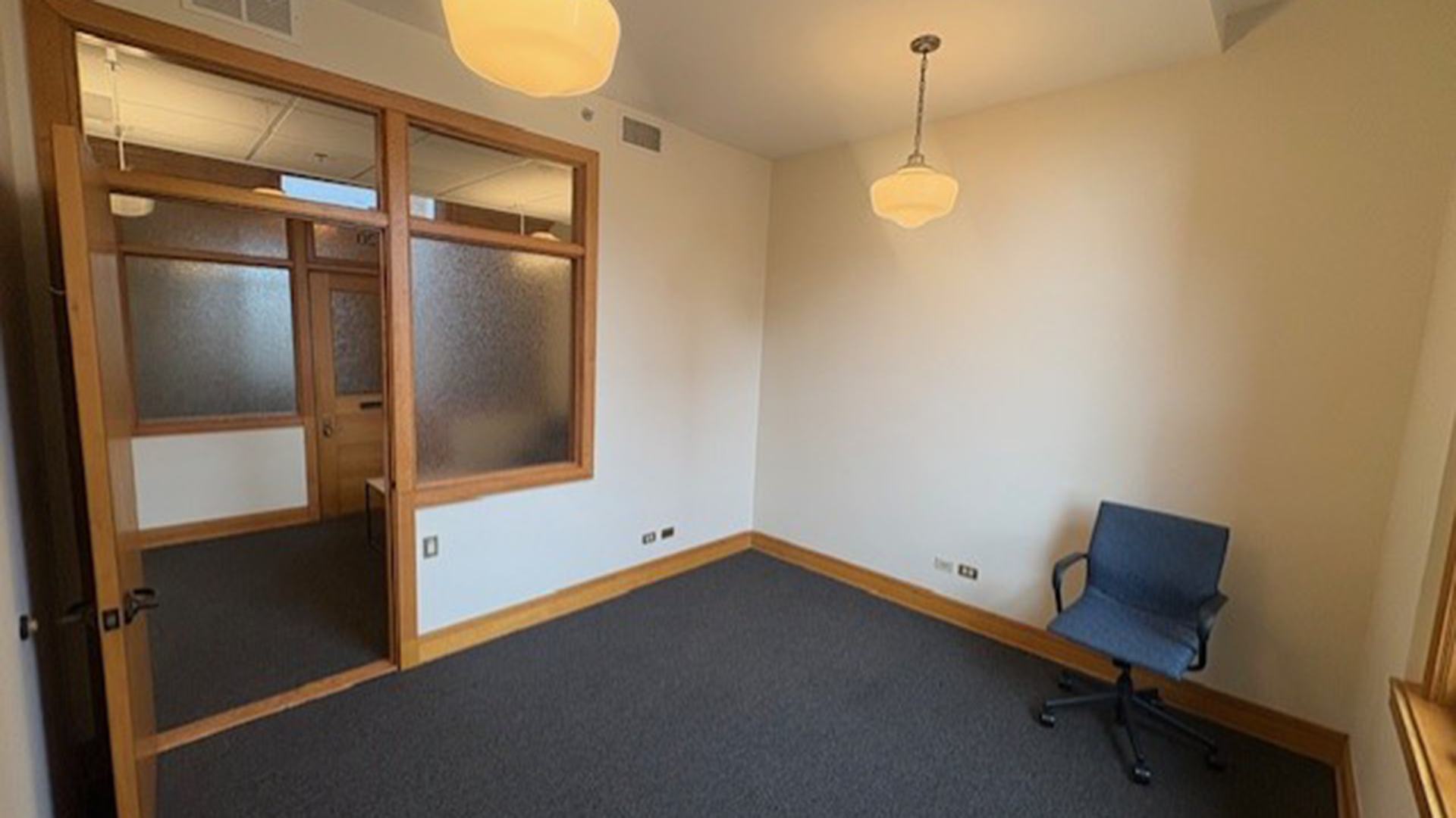 office room for rent at 53 W Jackson with chair