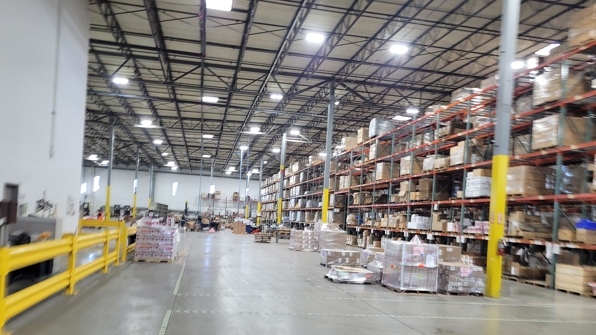 Interior warehouse view with boxes on shelves at 700 Gateway