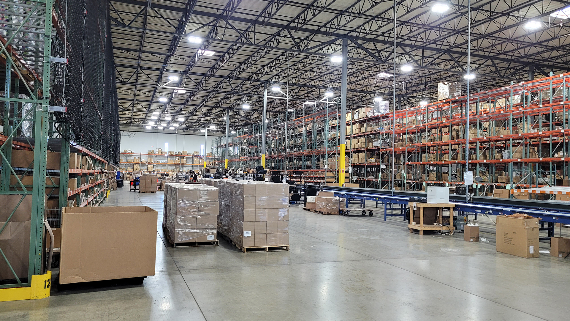 Interior warehouse with boxes, shelves, and lights at 700 Gateway 
