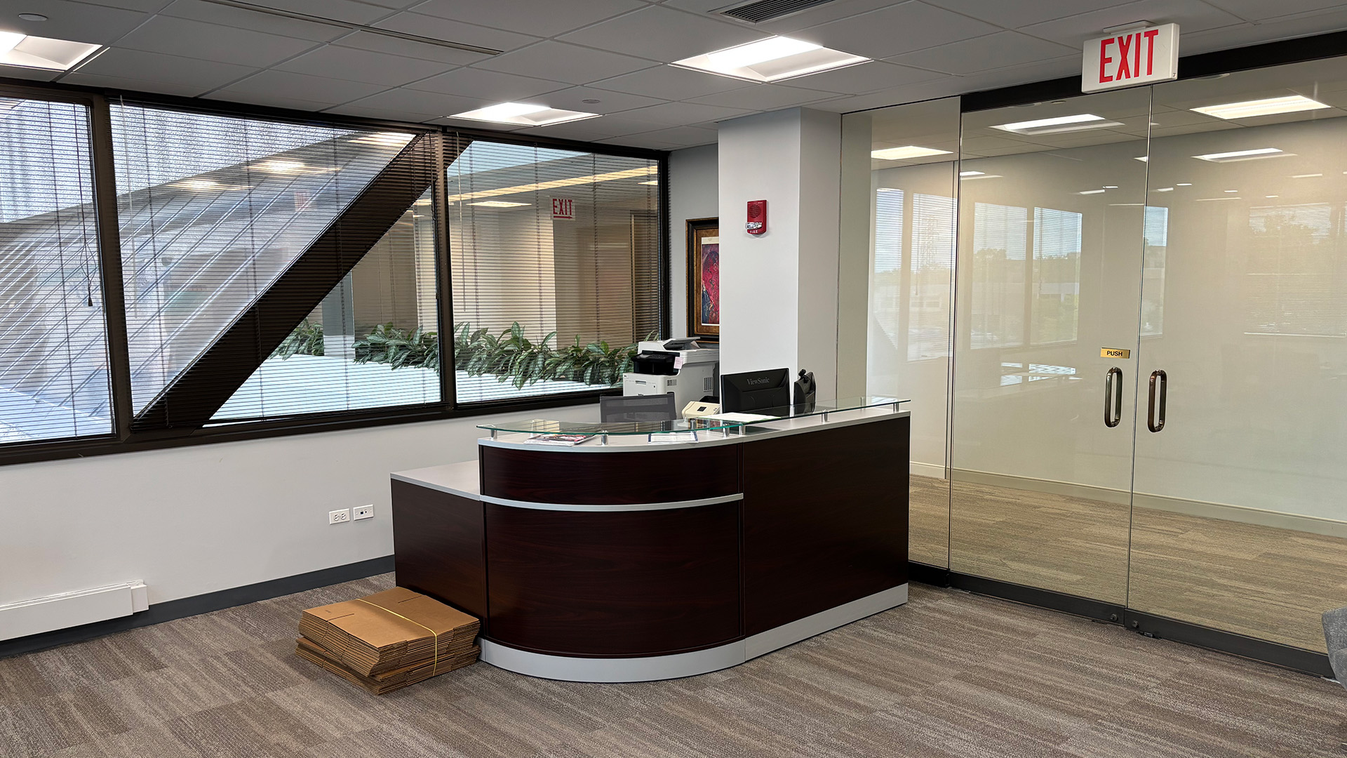 Reception desk and entrance of suite 340 inside 707 Skokie Blvd