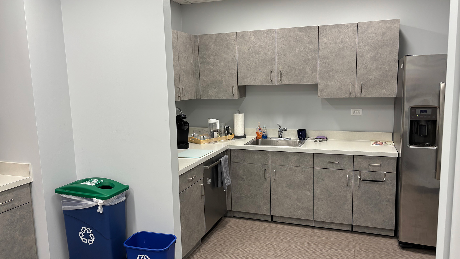 Kitchenette area with fridge and counter space inside suite 340 at 707 Skokie Blvd