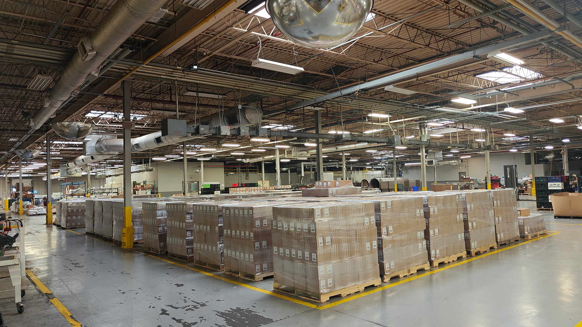 Palleted storage inside of operating food production facility