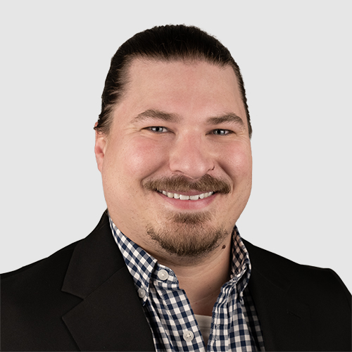 Matt Fossali Headshot on grey background
