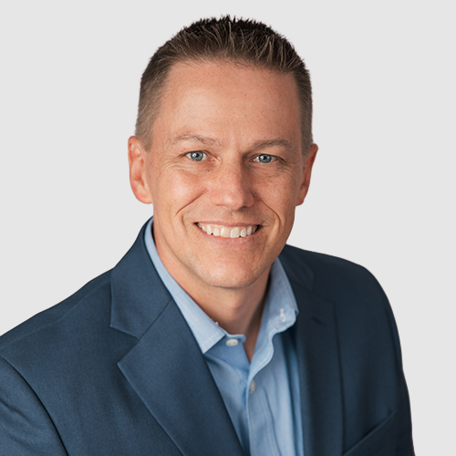 Ted Collins headshot on grey background