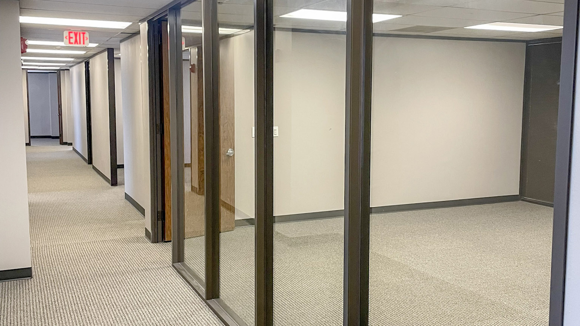 2626 S Loop W - Glass Fronts Photo