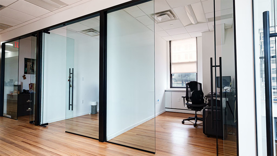 View from hallway looking toward glass front conference rooms