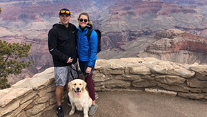 Madeline Rumpf with her dog at the Grand Canyon